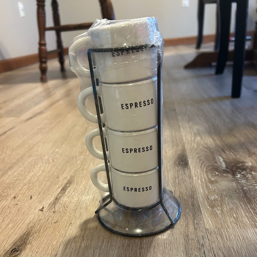 NIB. 4 Espresso mugs in wire holder.